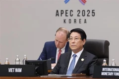 越南国家主席梁强出席2025年APEC领导人会议第一阶段会议。图自越通社