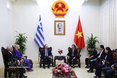 越南政府副总理胡国勇会见希腊议会第一副议长。图自越通社