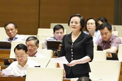 越南内务部部长范氏青茶发言。图自越通社