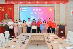 越通社向古巴提供援助。图自越通社