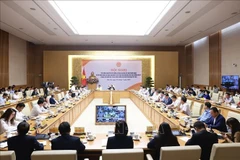 会议现场。图自越通社