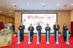 “革命之路——胡志明同志在中国”专题展在重庆举行。图自国际报