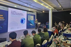 越南公安部对外局副局长黎黄阳大校发表讲话。图自越通社