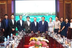 双方代表合影。图自越通社