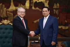 越南政府总理范明政会见日越友好协会关西地区分会主席祯西村。图自越通社