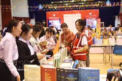 老挝第六届国际图书节现场。图自越通社