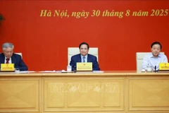 会议现场。图自越通社