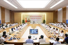 会议现场。图自越通社
