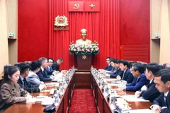 会见现场。图自越通社