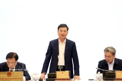 越南国家银行副行长范青河发言。图自越通社