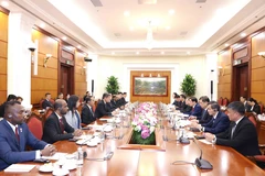 会谈现场。图自越通社