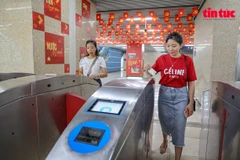 在河内城铁应用程序上试点使用周票。图自民族与信息报