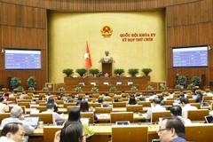 会议场景。图自越通社