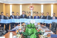 双方代表合影。图自人民报