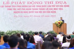 政府总理发起迎接越共十四大和第十六届国会选举的竞赛运动。图自越通社