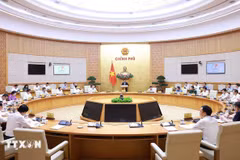 会议场景。图自越通社