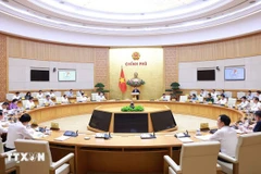 会议场景。图自越通社