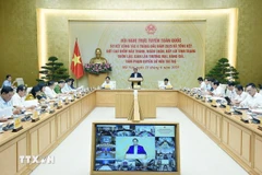 会议场景。图自越通社