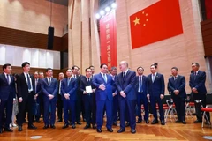 越南政府总理范明政于6月26日上午前往上海证券交易所（SSE）考察。图自越通社