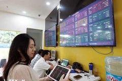 外资在越南股市升级后重返净买入。图自越通社