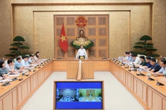 会议现场。图自越通社
