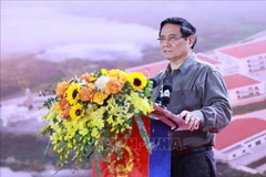 范明政总理发表讲话。图自越通社