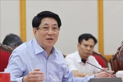 国家主席梁强发言。图自越通社