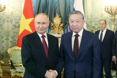 越共中央总书记苏林与俄罗斯总统普京。图自越通社