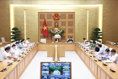 会议现场。图自越通社