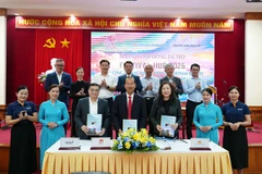 签约仪式现场。图自越通社