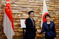 新加坡总理黄循财和日本首相高市早苗。图自AP