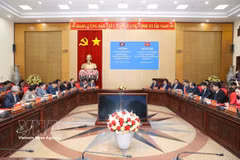 工作会谈现场。图自越通社