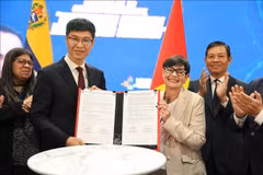邮电学院与UNC合作备忘录签署仪式。图自越通社
