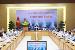 会议现场。图自越通社