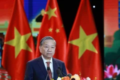 苏林总书记在活动上发言。图自越通社