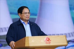越南政府总理范明政发言。图自越通社
