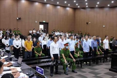 郑文决获减刑14年。图自越通社