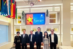 双方代表合影。图自越通社
