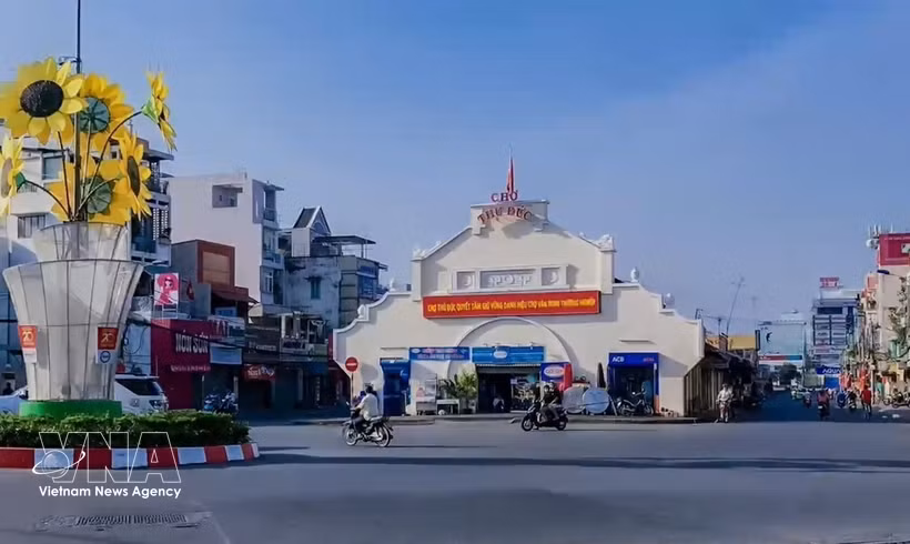 胡志明市守德坊是全国首个通过公布“幸福坊”标准体系。图自越通社