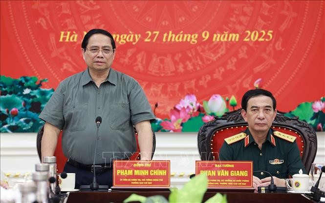 越南政府总理范明政在会议上发表讲话。图自越通社