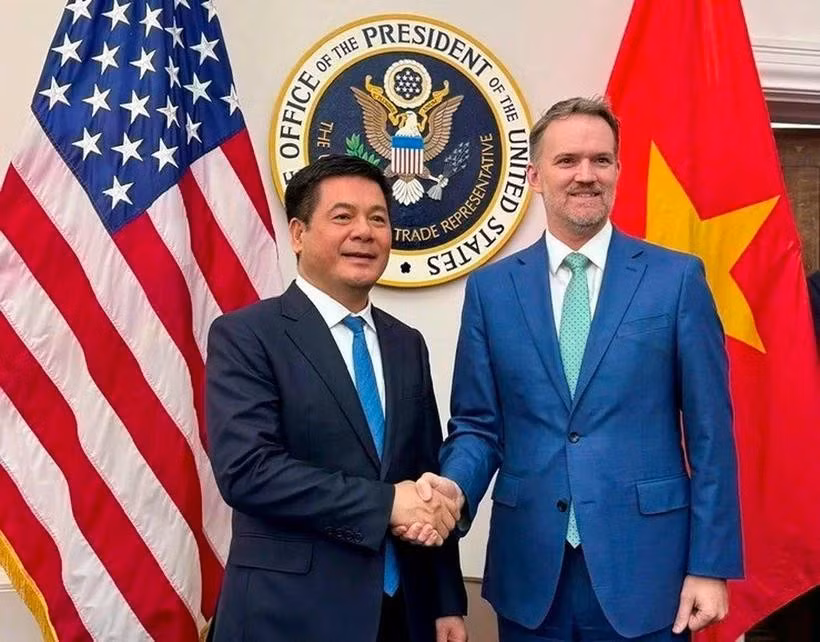 越南工贸部长阮鸿延与美国贸易代表贾米森·格里尔（Jamieson Greer）。图自越通社