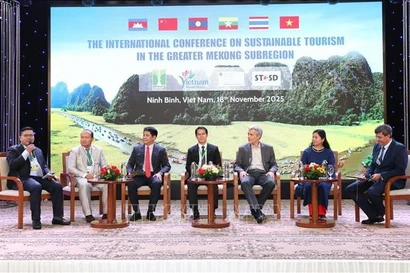 与会代表。图自越通社