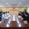 双方会见场景。图自越通社