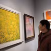 此展参观者。图自越通社