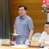 越南工贸部副部长阮生日新解答媒体记者的提问。图自越通社