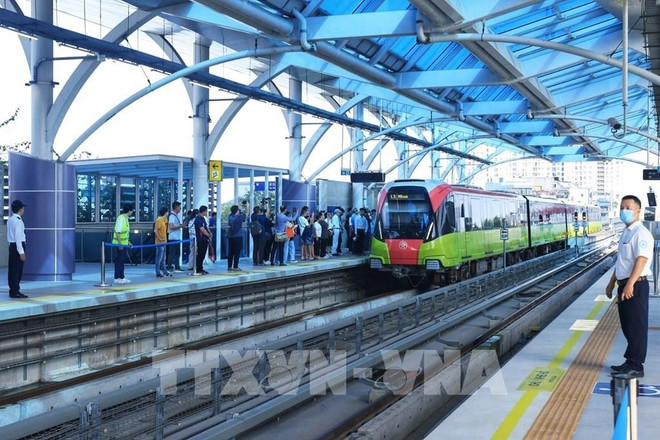 附图 图自越通社 095744-chinh-thuc-khai-thac-thuong-mai-tuyen-duong-sat-do-thi-nhon-ga-ha-noi-doan-tren-cao.jpg