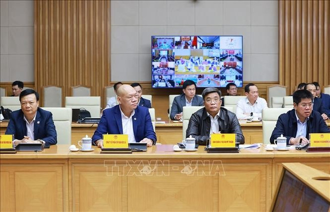 会议场景。图自越通社 gtvt-ttcp-pham-minh-chinh-09032025-07.jpg