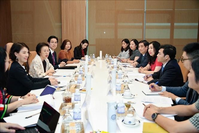 会议现场。图自越通社 vna-potal-bkk10062ban-anh-viet-nam-va-thai-lan-thuc-day-hop-tac-nghe-ca-ben-vung-stand.jpg