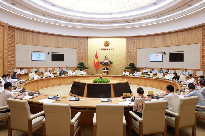 会议现场。图自越通社 vna-potal-thu-tuong-chu-tri-hop-danh-gia-ket-qua-van-hanh-mo-hinh-chinh-quyen-dia-phuong-hai-cap-8309935.jpg