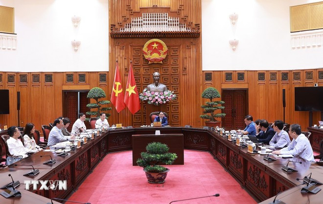 会议现场。图自越通社 2806-thu-tuong-kinh-te-4.jpg